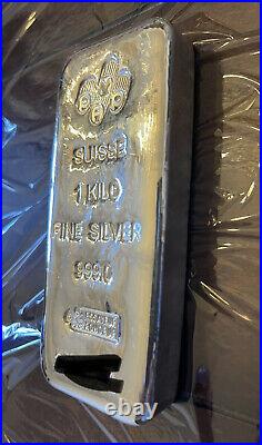 1 Kilo PAMP Suisse Silver Cast Bar. 999 Fine with Assay Card In Serial Numbers