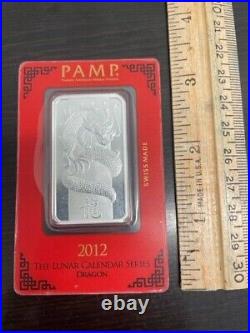 2012 PAMP Suisse Lunar Year of the Dragon 1 oz. 999 Silver Bar in Assay card