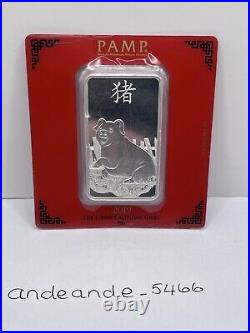 Pamp Suisse 2019 Lunar Year of the Pig 100 gram Silver Bar in Assay Card