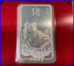 Pamp Suisse 2019 Lunar Year of the Pig 100 gram Silver Bar in Assay Card