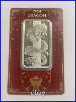 Pamp Suisse 50 Gram Silver. 999 Fine Lunar Dragon Hologram Prooflike Bar #1613